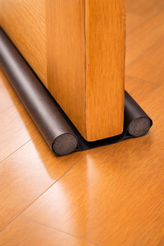 Double under door draught - under,